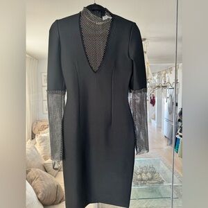 Black spandex, midi dress with rhinestone, sheer arms, and chest area